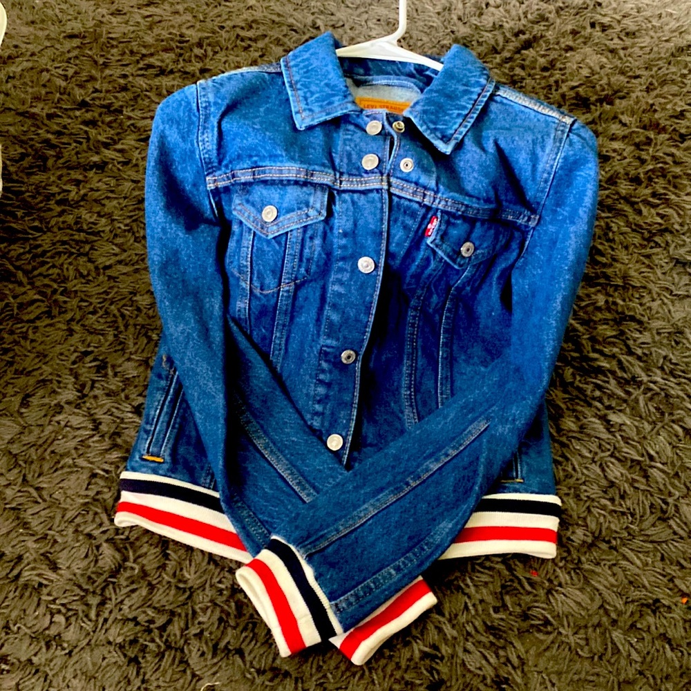 Levi Strauss Denise jacket with red, white, and blue trim. Brand new. Never worn